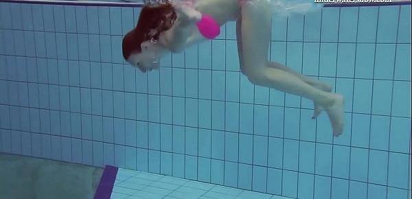  Pink swimswear babe Lera showing naked body underwater